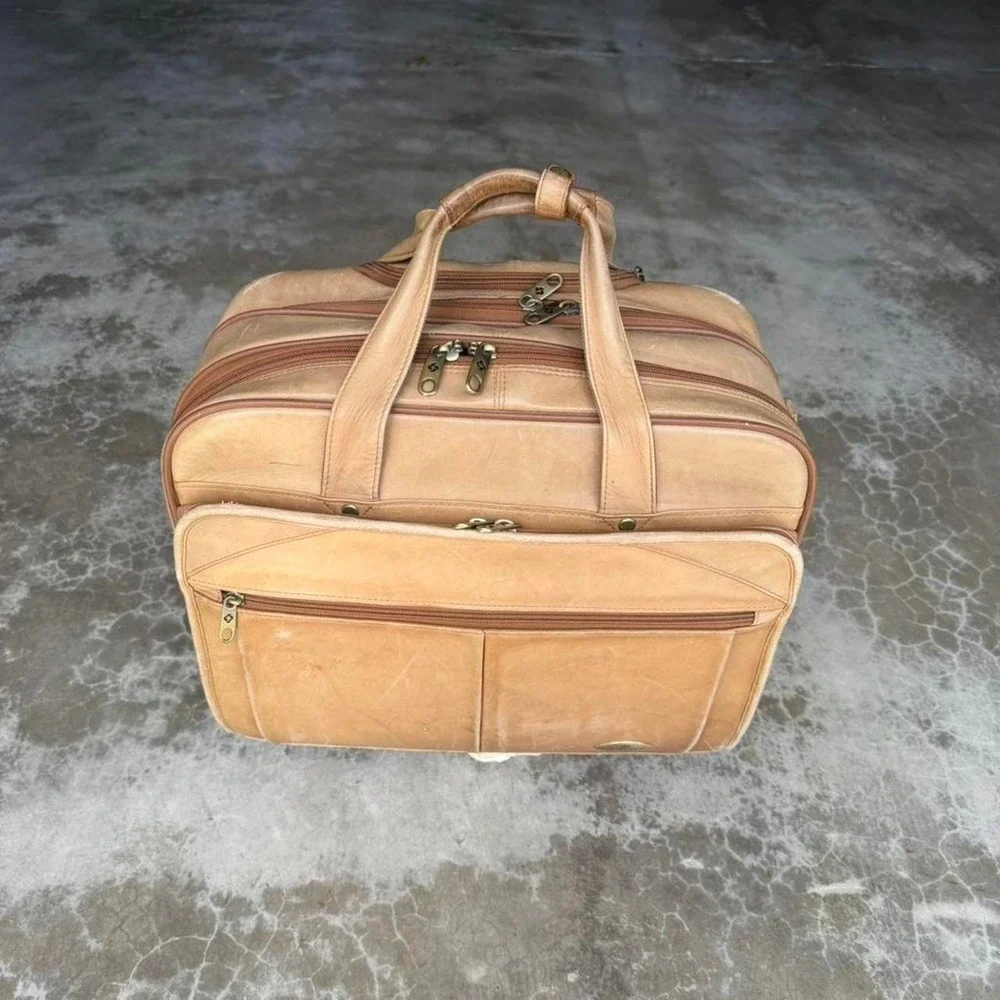 Vintage Natural Tan leather rolling luggage carry on suit case duffle bag